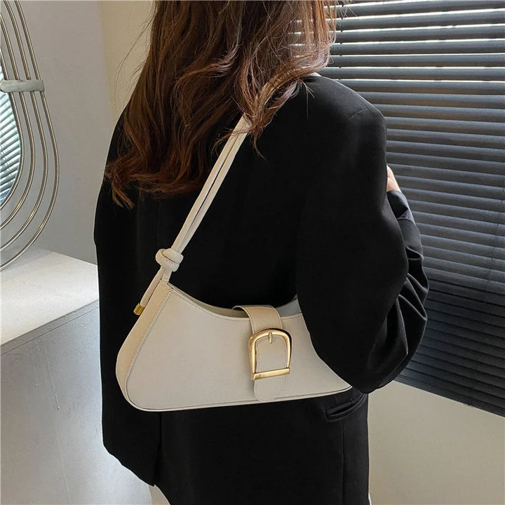 Baguette bag, design minimalista meia-lua, alça curta
